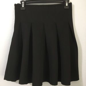 Black high waisted skirt.